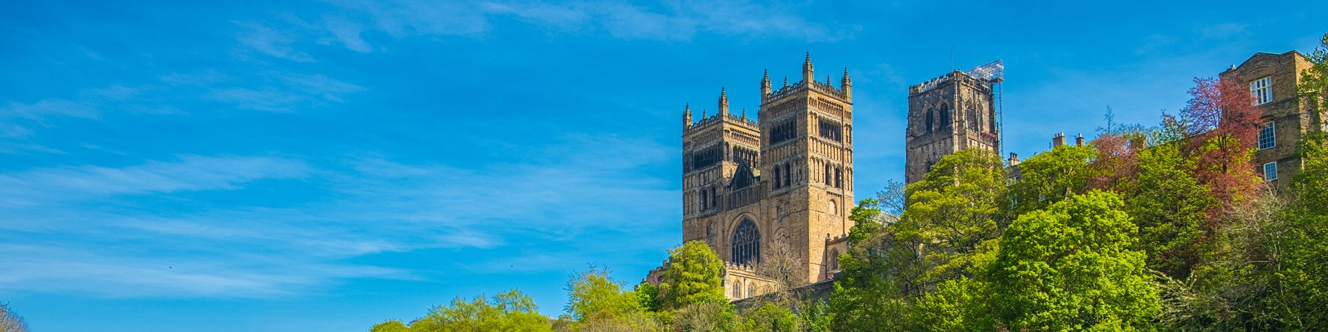 a view of Durham cathedral from the river